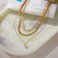 Vivienne Gold Triple-Layer Pendant Necklace